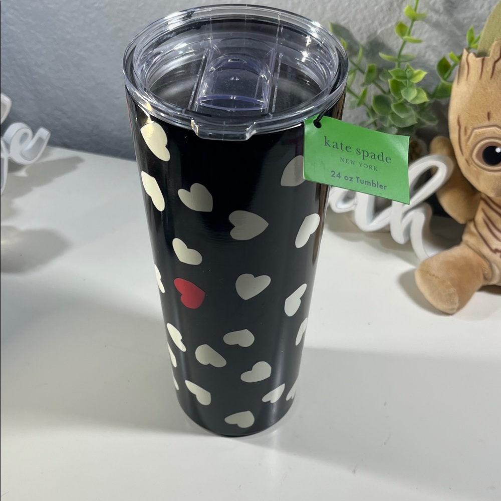 kate spade black tumbler with cream heart pattern and red accent